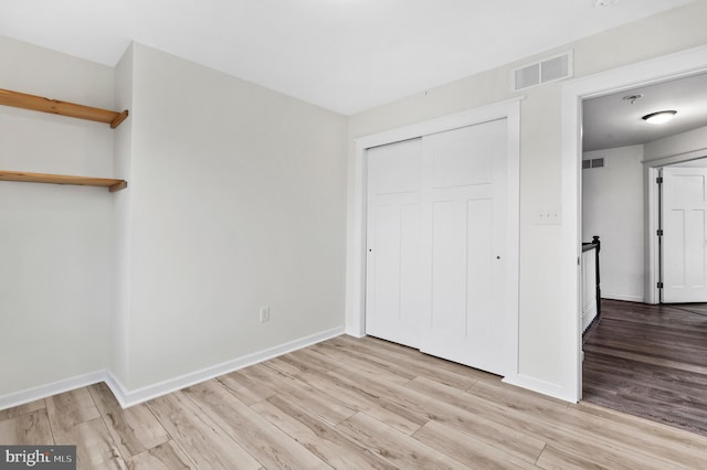 7 Compton Way, Barto, PA 19504 - unfurnished bedroom with light wood finished floors and a closet