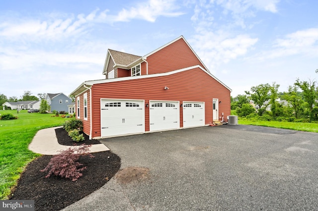 7 Compton Way, Barto, PA 19504 - view of home's exterior featuring driveway, a lawn, and a garage