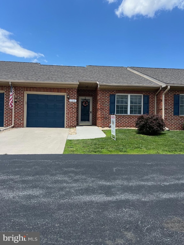 124 Sunbrook Ln Unit 166, Hagerstown, MD 21742 - view of front of property featuring an attached garage, brick siding, driveway, and roof with shingles