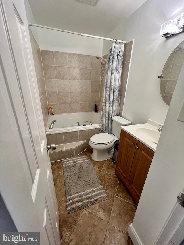 9837 Buckner Rd, Manassas, VA 20110 - full bath with tiled shower / bath, vanity, and tile patterned flooring