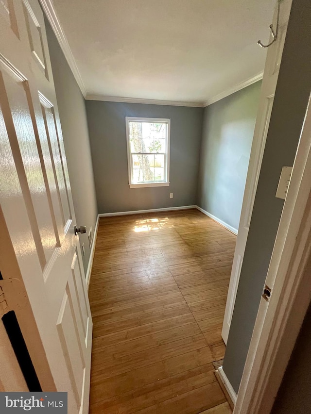 9837 Buckner Rd, Manassas, VA 20110 - spare room with crown molding and wood finished floors