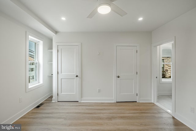 221 Ford St, Conshohocken, PA 19428 - unfurnished bedroom featuring multiple windows, recessed lighting, light wood-style floors, and ceiling fan