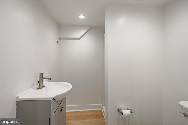 221 Ford St, Conshohocken, PA 19428 - bathroom with vanity, wood finished floors, and recessed lighting