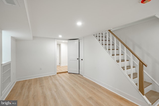 221 Ford St, Conshohocken, PA 19428 - finished below grade area with stairway, recessed lighting, and wood finished floors