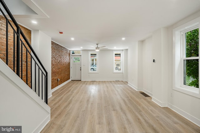 221 Ford St, Conshohocken, PA 19428 - unfurnished living room with ceiling fan, brick wall, light wood finished floors, and recessed lighting