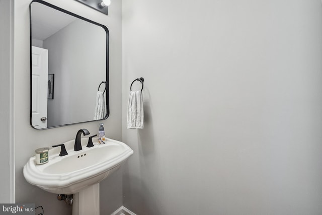 52 Ocean Breeze Ct, Manahawkin, NJ 08050 - bathroom with a sink and baseboards