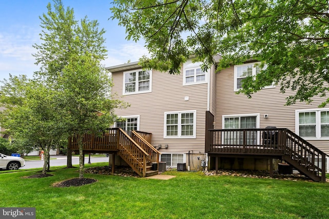 52 Ocean Breeze Ct, Manahawkin, NJ 08050 - rear view of property featuring stairway, a wooden deck, and a lawn