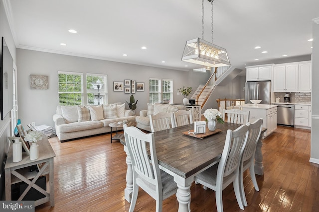 52 Ocean Breeze Ct, Manahawkin, NJ 08050 - dining space featuring stairway, healthy amount of natural light, recessed lighting, hardwood / wood-style flooring, and crown molding