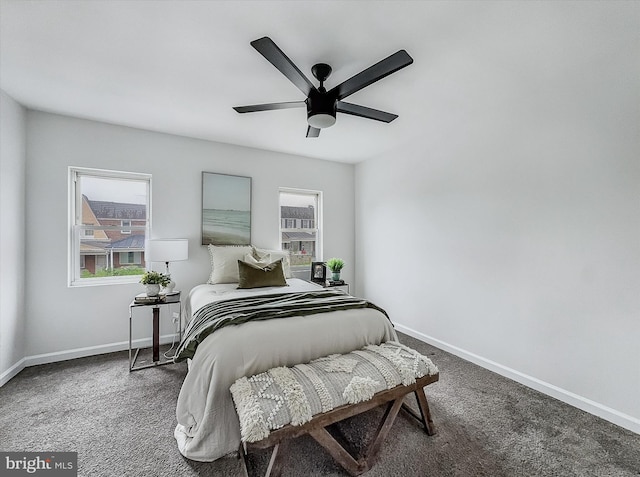 3922 Woodridge Rd, Baltimore, MD 21229 - carpeted bedroom with multiple windows and ceiling fan