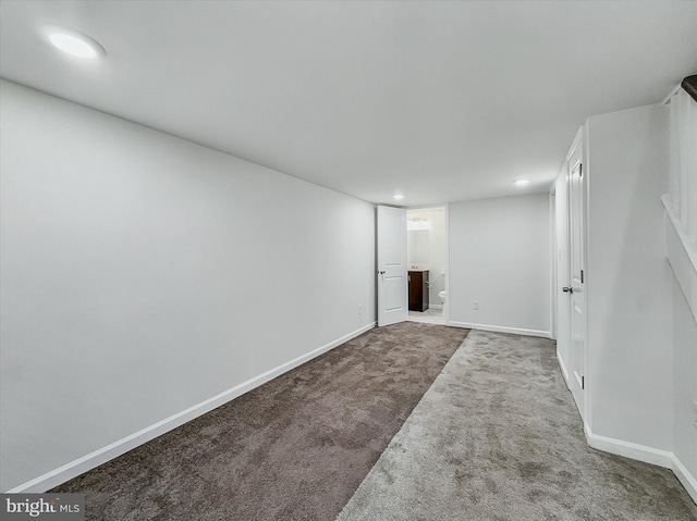 3922 Woodridge Rd, Baltimore, MD 21229 - finished below grade area with dark carpet and recessed lighting