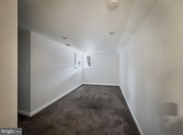 3922 Woodridge Rd, Baltimore, MD 21229 - empty room featuring a smoke detector and dark carpet