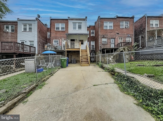 3922 Woodridge Rd, Baltimore, MD 21229 - rear view of house with stairs