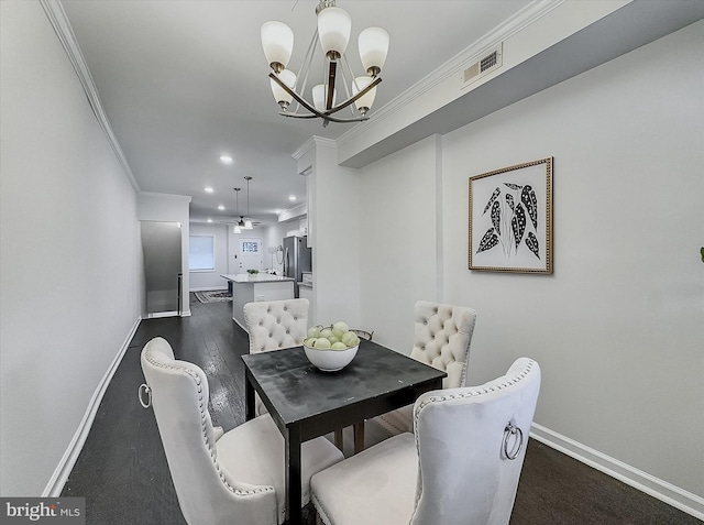 3922 Woodridge Rd, Baltimore, MD 21229 - dining space with crown molding, a chandelier, and recessed lighting