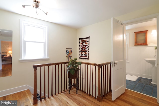 1203 Old Boalsburg Rd, State College, PA 16801 - staircase featuring wood finished floors and baseboards