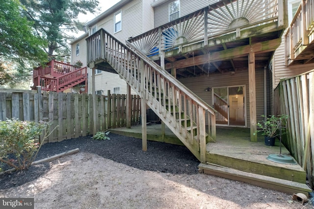 1951 Flowering Tree Ter, Silver Spring, MD 20902 - view of patio / terrace featuring stairway and a wooden deck