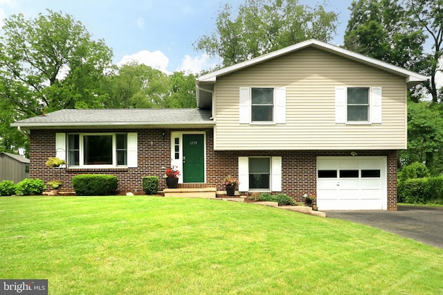 1239 Circleville Rd, State College, PA 16803 - tri-level home featuring brick siding, driveway, and a garage