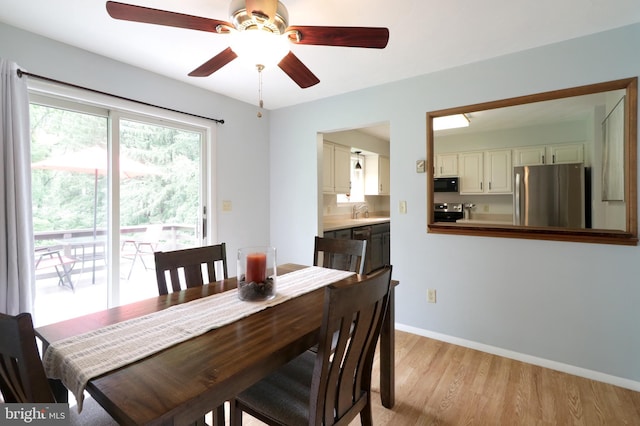 1239 Circleville Rd, State College, PA 16803 - dining area featuring light wood-type flooring and ceiling fan
