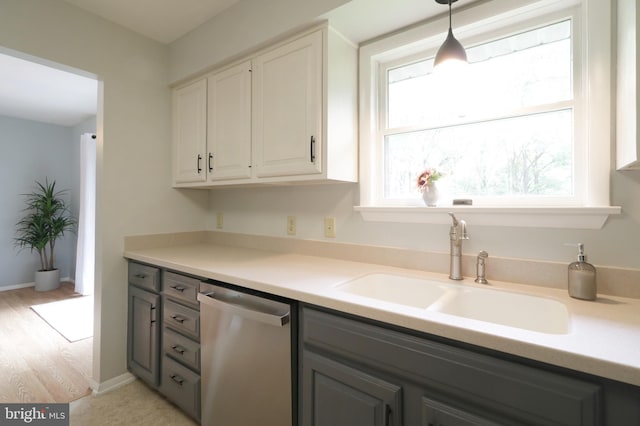 1239 Circleville Rd, State College, PA 16803 - kitchen with dishwasher, pendant lighting, light countertops, and gray cabinetry