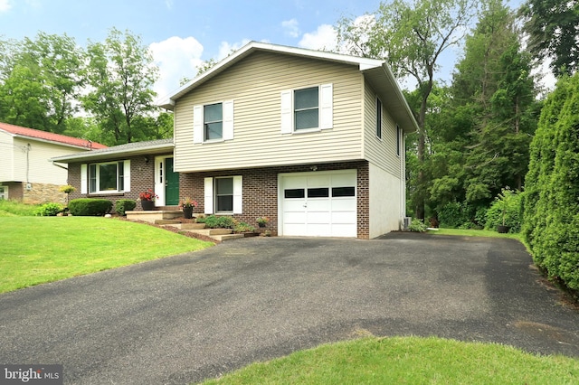 1239 Circleville Rd, State College, PA 16803 - split level home with brick siding, a front lawn, driveway, and a garage
