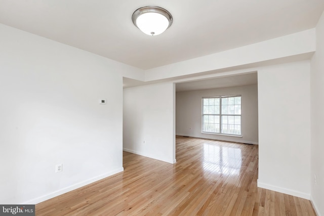 18432 Gardenia Way, Gaithersburg, MD 20879 - unfurnished room with baseboards and light wood finished floors