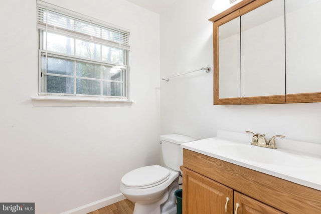 18432 Gardenia Way, Gaithersburg, MD 20879 - half bathroom with vanity and wood finished floors