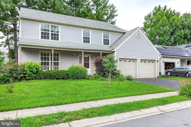 18432 Gardenia Way, Gaithersburg, MD 20879 - traditional-style house with a garage, asphalt driveway, a front lawn, and a porch