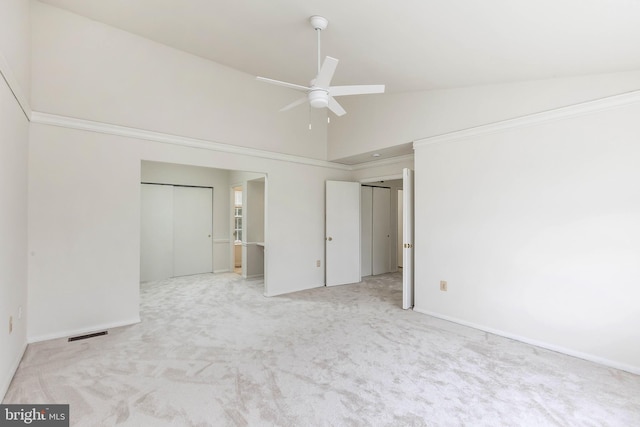 18432 Gardenia Way, Gaithersburg, MD 20879 - unfurnished bedroom featuring high vaulted ceiling, carpet flooring, ceiling fan, and multiple closets