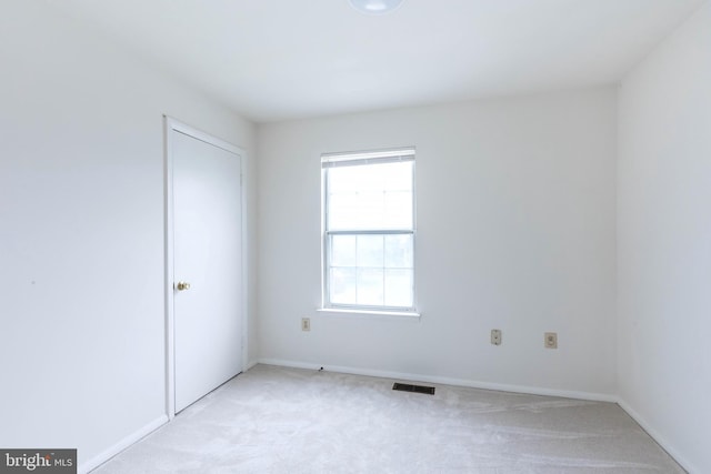 18432 Gardenia Way, Gaithersburg, MD 20879 - spare room featuring light carpet and baseboards