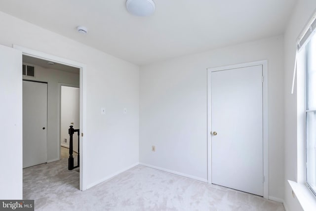 18432 Gardenia Way, Gaithersburg, MD 20879 - unfurnished bedroom with light carpet and baseboards