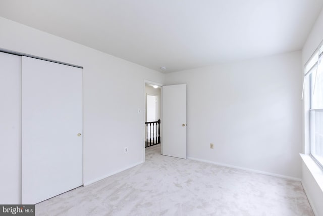 18432 Gardenia Way, Gaithersburg, MD 20879 - unfurnished bedroom with light colored carpet and a closet
