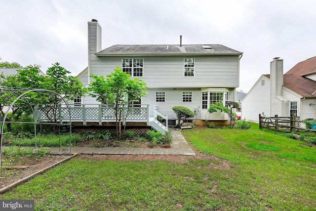 18432 Gardenia Way, Gaithersburg, MD 20879 - back of house featuring a wooden deck and a chimney