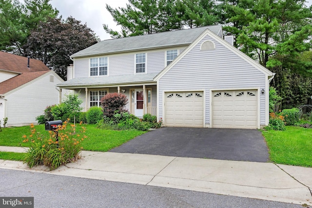 18432 Gardenia Way, Gaithersburg, MD 20879 - traditional home with driveway, a chimney, an attached garage, and a front lawn
