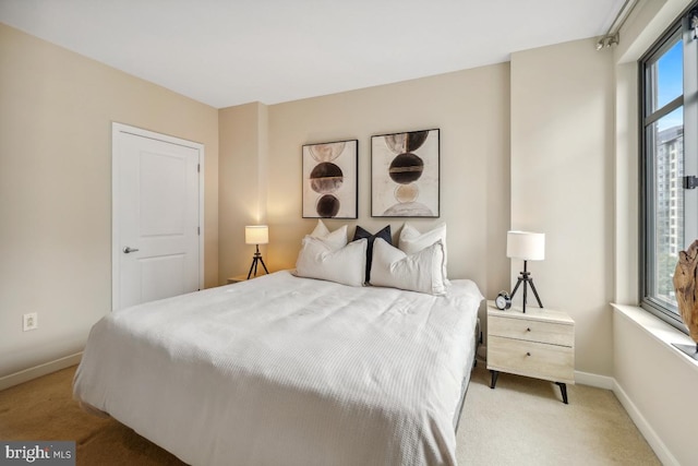 475 K St NW Unit 522, Washington, DC 20001 - bedroom featuring light carpet and baseboards