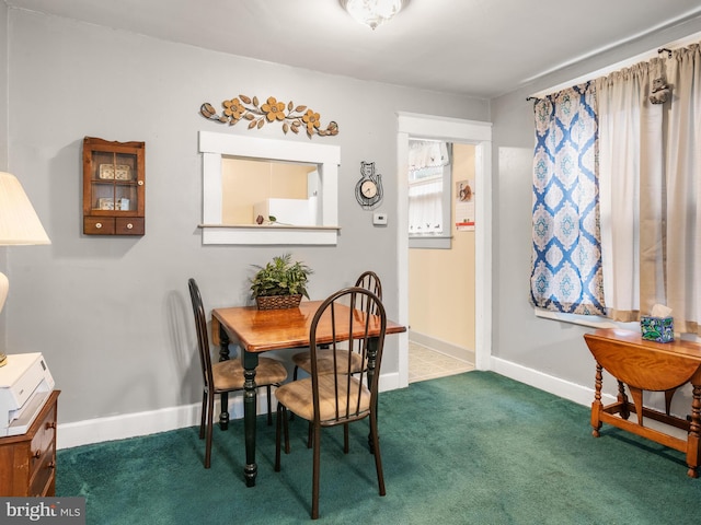 1065 Broadway Blvd, Reading, PA 19607 - carpeted dining room with baseboards