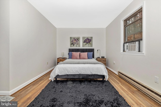 2 Forest Trl, Fairfield, PA 17320 - bedroom with a baseboard heating unit, light wood-style floors, and cooling unit