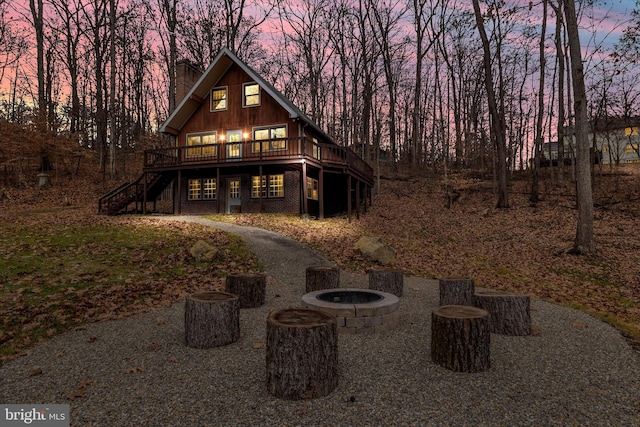 2 Forest Trl, Fairfield, PA 17320 - view of front of house featuring stairs, a fire pit, a chimney, and a wooden deck