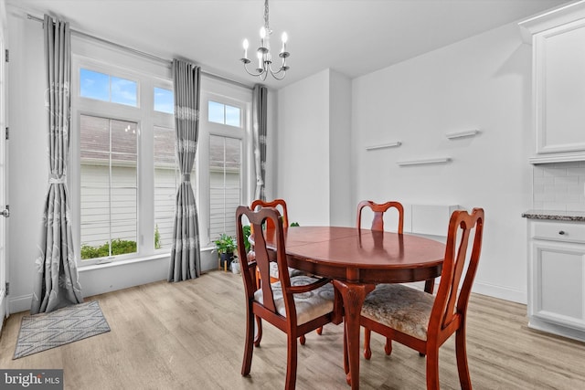 217 Hoke Farm Way, Mechanicsburg, PA 17050 - dining space with light wood finished floors, plenty of natural light, and a chandelier