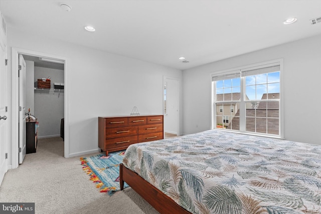 217 Hoke Farm Way, Mechanicsburg, PA 17050 - bedroom with a walk in closet, light carpet, a closet, and recessed lighting