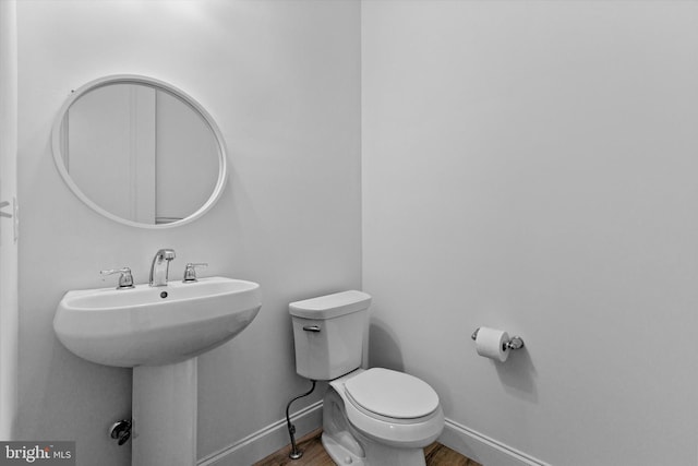217 Hoke Farm Way, Mechanicsburg, PA 17050 - bathroom with wood finished floors and toilet