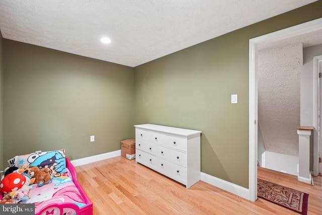 16041 Macedonia Dr, Woodbridge, VA 22191 - bedroom with light wood-style flooring and recessed lighting