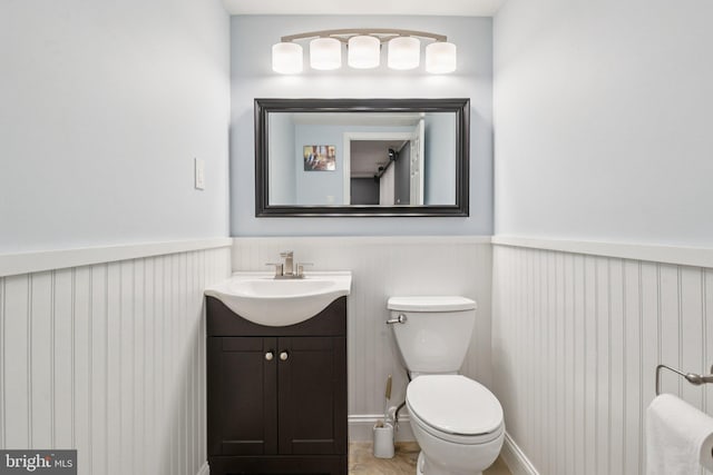 16041 Macedonia Dr, Woodbridge, VA 22191 - bathroom with vanity and wainscoting