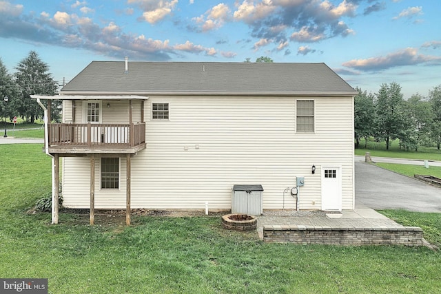 5 Stahle Ln, Dover, PA 17315 - rear view of property with an outdoor fire pit, a yard, and a balcony