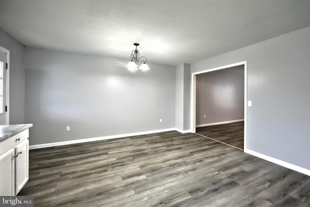 5 Stahle Ln, Dover, PA 17315 - unfurnished dining area with dark wood finished floors and a chandelier