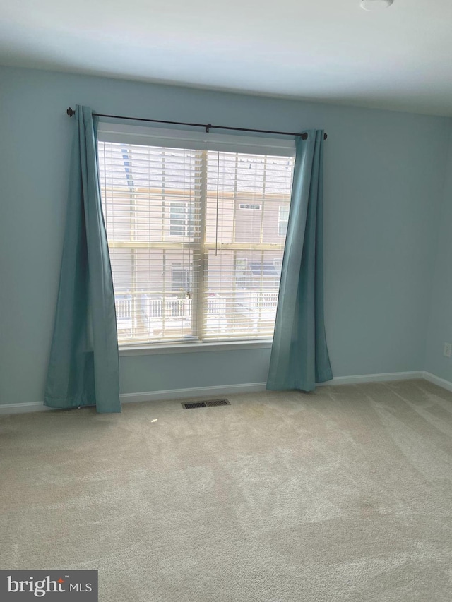8930 Shadia Pl, Manassas, VA 20110 - empty room with healthy amount of natural light and carpet