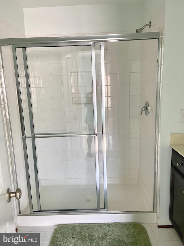8930 Shadia Pl, Manassas, VA 20110 - full bath featuring a shower stall, vanity, and tile patterned floors
