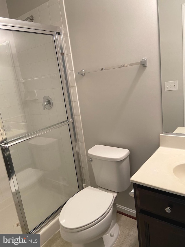8930 Shadia Pl, Manassas, VA 20110 - full bath featuring vanity, a stall shower, and tile patterned flooring