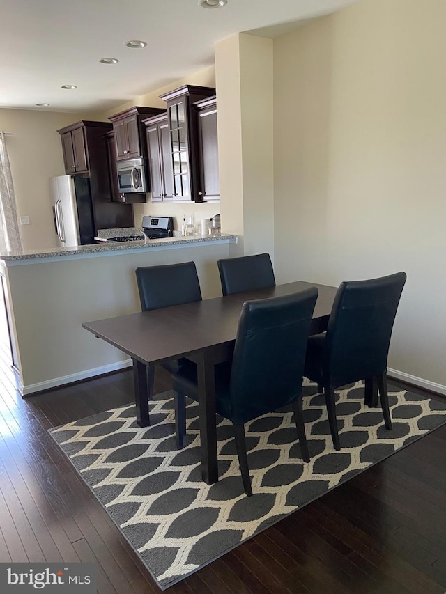 8930 Shadia Pl, Manassas, VA 20110 - dining space featuring dark wood finished floors