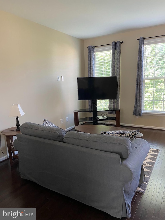 8930 Shadia Pl, Manassas, VA 20110 - living area with dark wood-type flooring and baseboards