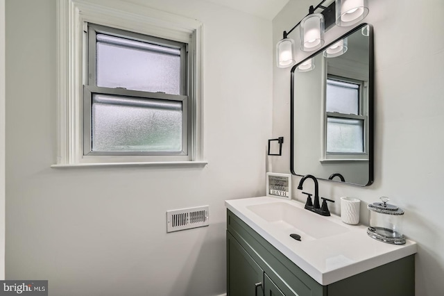 3814 Cedardale Rd, Baltimore, MD 21215 - bathroom with vanity and healthy amount of natural light