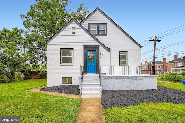 3814 Cedardale Rd, Baltimore, MD 21215 - bungalow-style home featuring a front lawn and brick siding